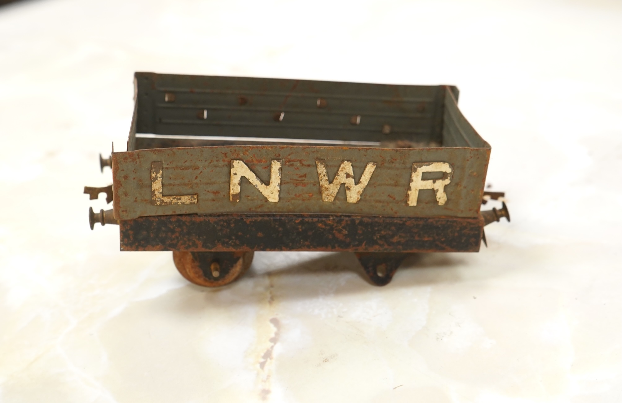 A Bing for Bassett Lowke 0 gauge tinplate clockwork LNER Ivatt 4-4-0 tender locomotive, 4390, together with an early Hornby clockwork 0-4-0, 2710, in GNR green livery with Meccano Ltd roundels to locomotive splasher and